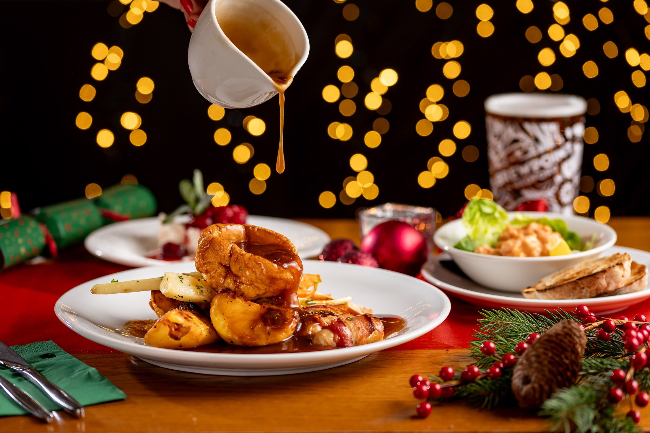 Christmas Dinner with Gravy being poured over it